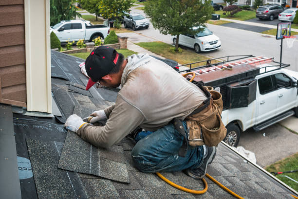 Professional Roofing technician working in Monterey, IN